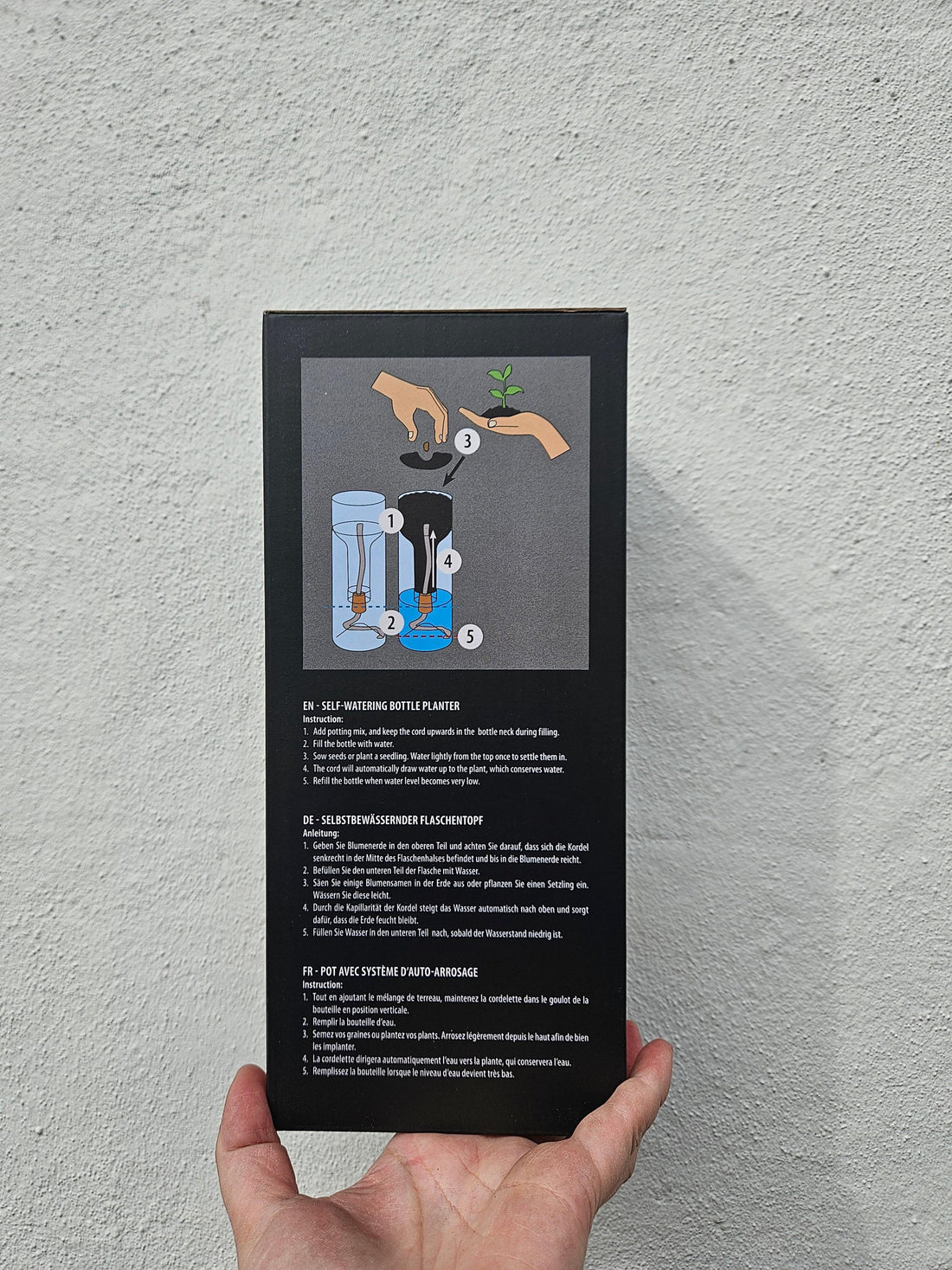 Self-watering bottle planter